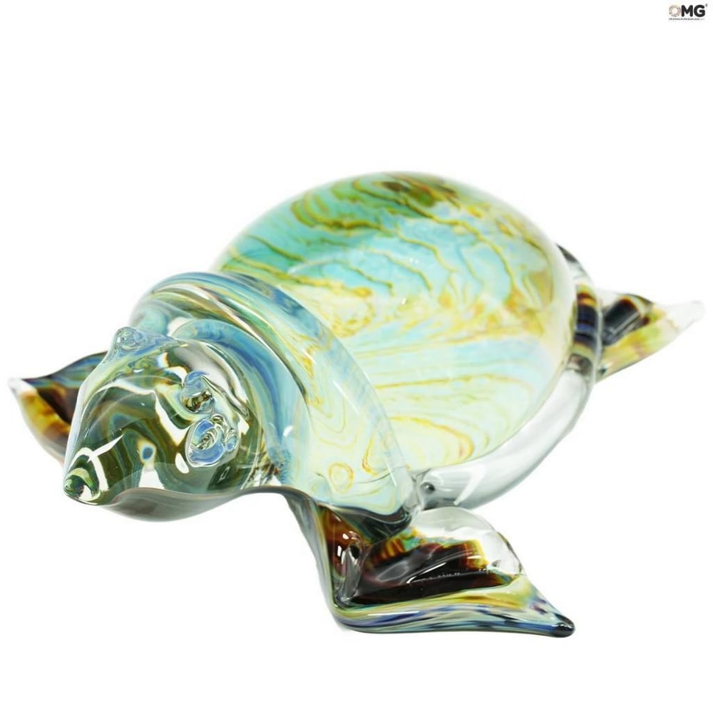 Chalcedony Glass Tortoise – Handcrafted Murano Glass: Chalcedony Glass Tortoise – Handcrafted Murano Glass This exclusive Murano glass sculpture depicts a tortoise, crafted in clear and chalcedony glass, shaped free-hand on a punty in solid glass, and 