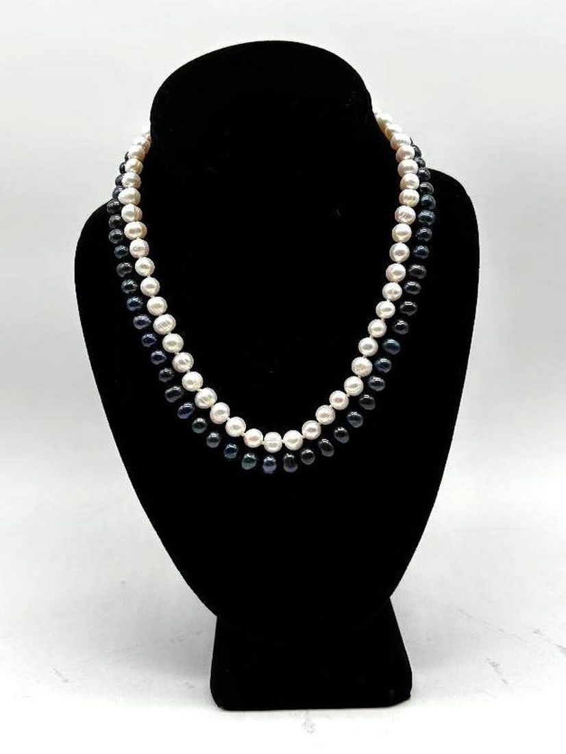 Double Harmony 2 Stand 17" Freshwater Pearl Necklace: Double Harmony 17" Freshwater Pearl Necklace This exquisite necklace features a seamless blend of one lustrous white strand and one opulent black strand of pearls, creating a harmonious symphony o