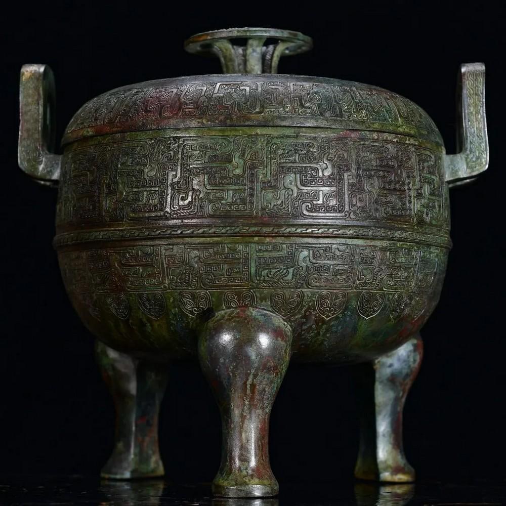 Antique Chinese Bronze Tripod Statue: Antique Chinese Bronze Tripod Statue This rare handcrafted bronze tripod statue exemplifies the elegance and cultural depth of ancient Chinese artistry. With a classic three-legged design, it symboliz