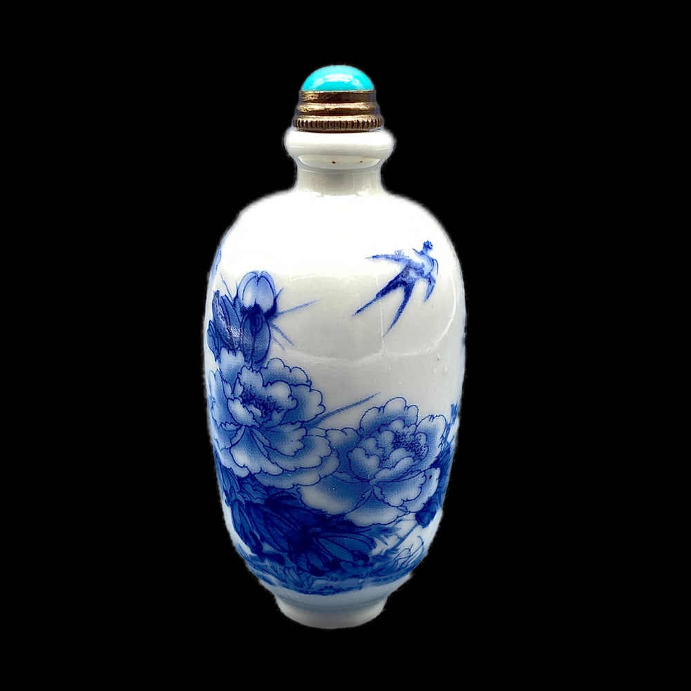 BLOOMING HANDMADE CHINESE PORCELAIN AND TURQUOISE SNUFF BOTTLE: Blooming Handmade Chinese Porcelain And Turquoise Snuff Bottle Carefully handmade Chinese floral porcelain and Turquoise snuff bottle. View photos for further details.