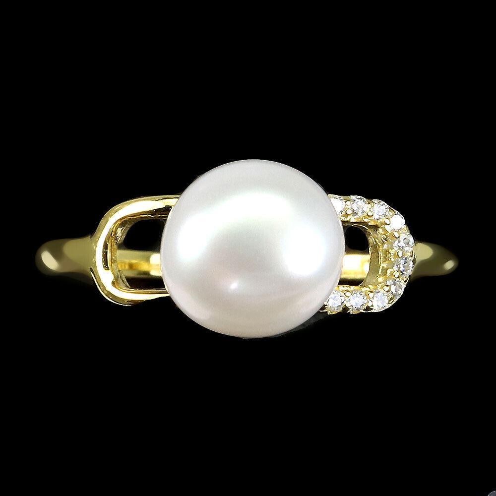 Round White Pearl 8mm Simulated Cz 925 Sterling Silver Ring: Round White Pearl 8mm Simulated Cz 925 Sterling Silver Ring Discover the timeless elegance of our White Pearl Ring, a piece that exudes sophistication and grace. At the heart of this stunning ring is 