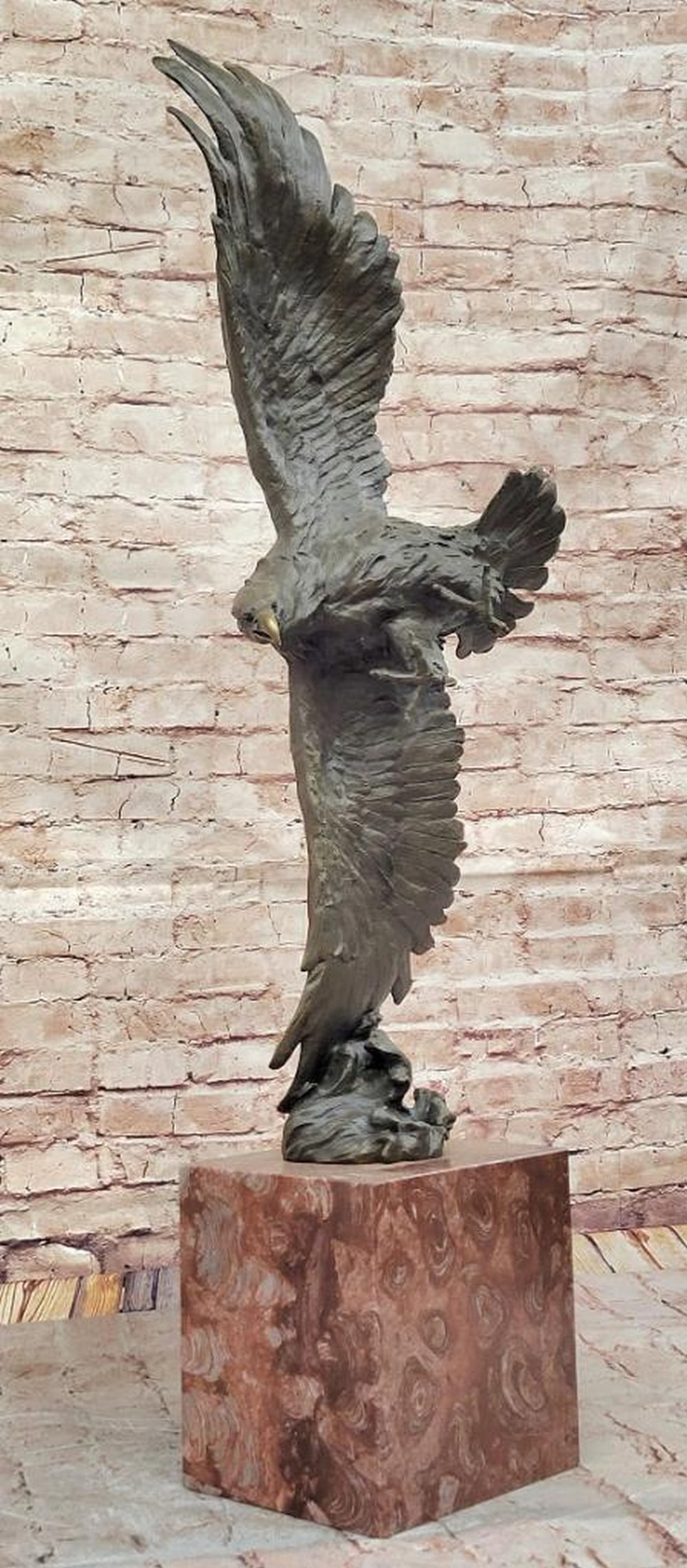 Bronze Bald Eagle in Flight Sculpture on Marble Base - 35" x 19": Bronze Bald Eagle in Flight Sculpture on Marble Base - 35" x 19" Bronze sculpture depicting a bald eagle in flight with wings extended and talons outstretched, mounted on a marble base. Handcr