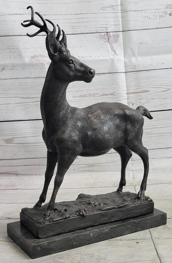 Original 'Noble Spirit' Buck Bronze Sculpture On Marble Base - 15" x 10": Original 'Noble Spirit' Buck Bronze Sculpture On Marble Base - 15" x 10" Immerse yourself in the serene beauty of nature with this captivating bronze sculpture. Witness the grace and e