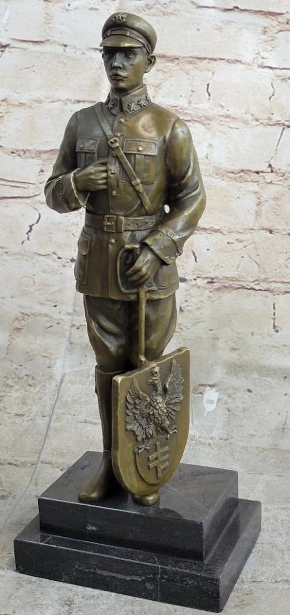 Polish Soldier Warrior Bronze Sculpture with Marble Base – 12" x 4.5": Polish Soldier Warrior Bronze Sculpture with Marble Base – 12" x 4.5" This bronze sculpture depicts a resolute Polish soldier holding a shield adorned with an eagle crest, capturing strength