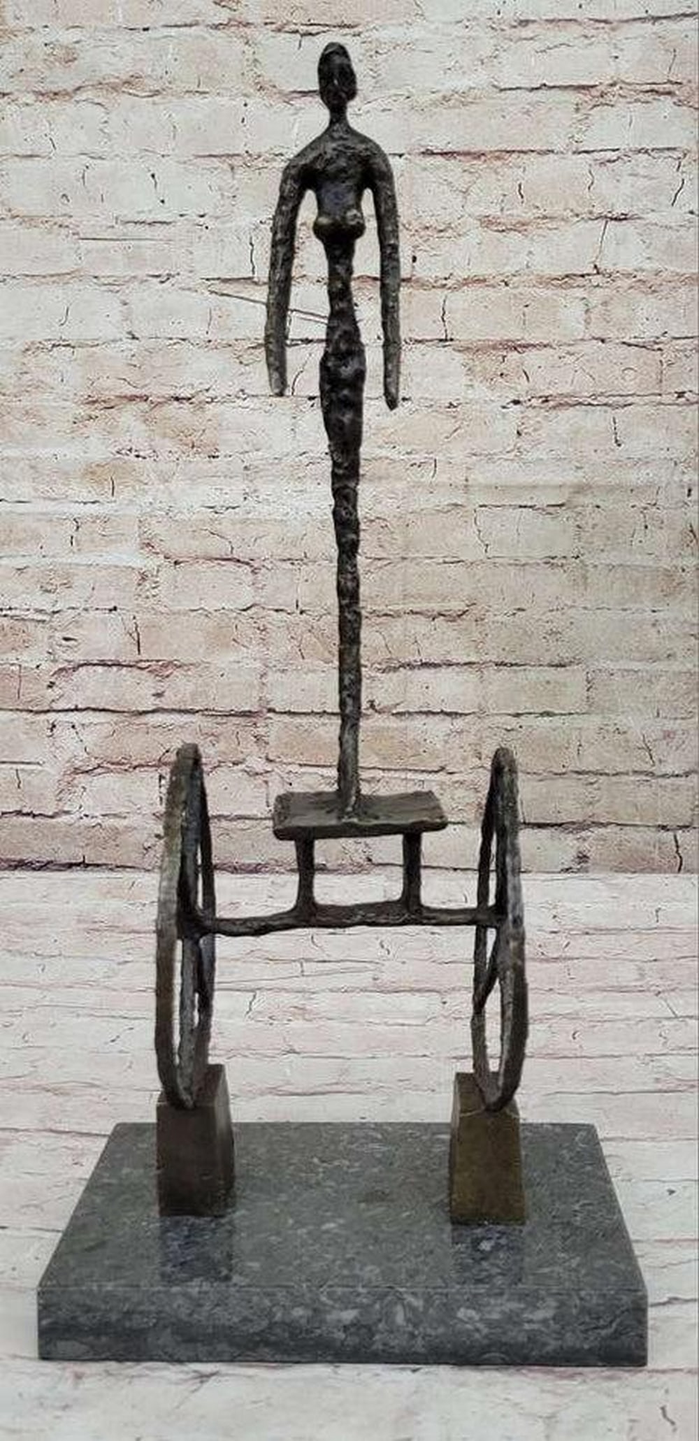 Ethereal Equilibrium Inspired Bronze Sculpture - "The Chariot" Signed by Giacometti - 18.5" x 8.5": Ethereal Equilibrium Inspired Bronze Sculpture - "The Chariot" Signed by Giacometti - 18.5" x 8.5" Immerse yourself in the captivating world of artistic ingenuity with "The Chariot