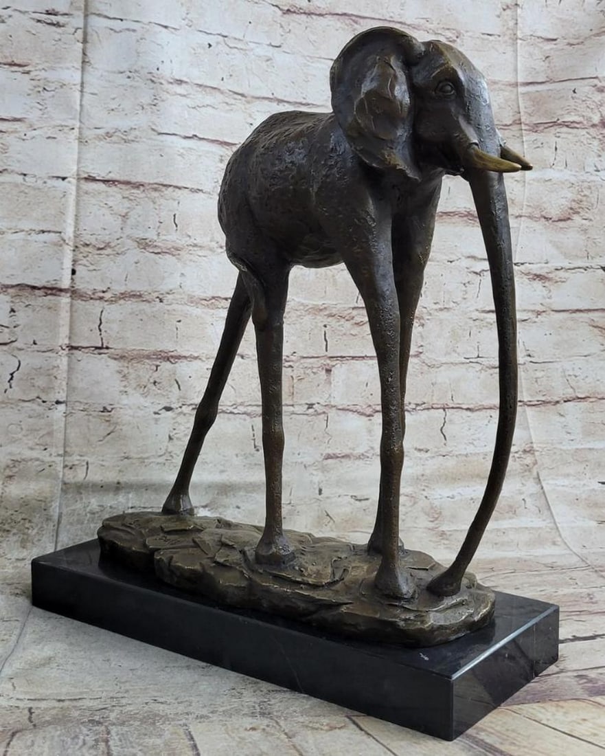 Space Elephant" Inspired Bronze Statue - 13.5" x 12: "Space Elephant" Inspired Bronze Statue - 13.5" x 12" Step into surreal wonder with the "Salvador Dali Space Elephant," a bronze masterpiece crafted to museum-quality standards