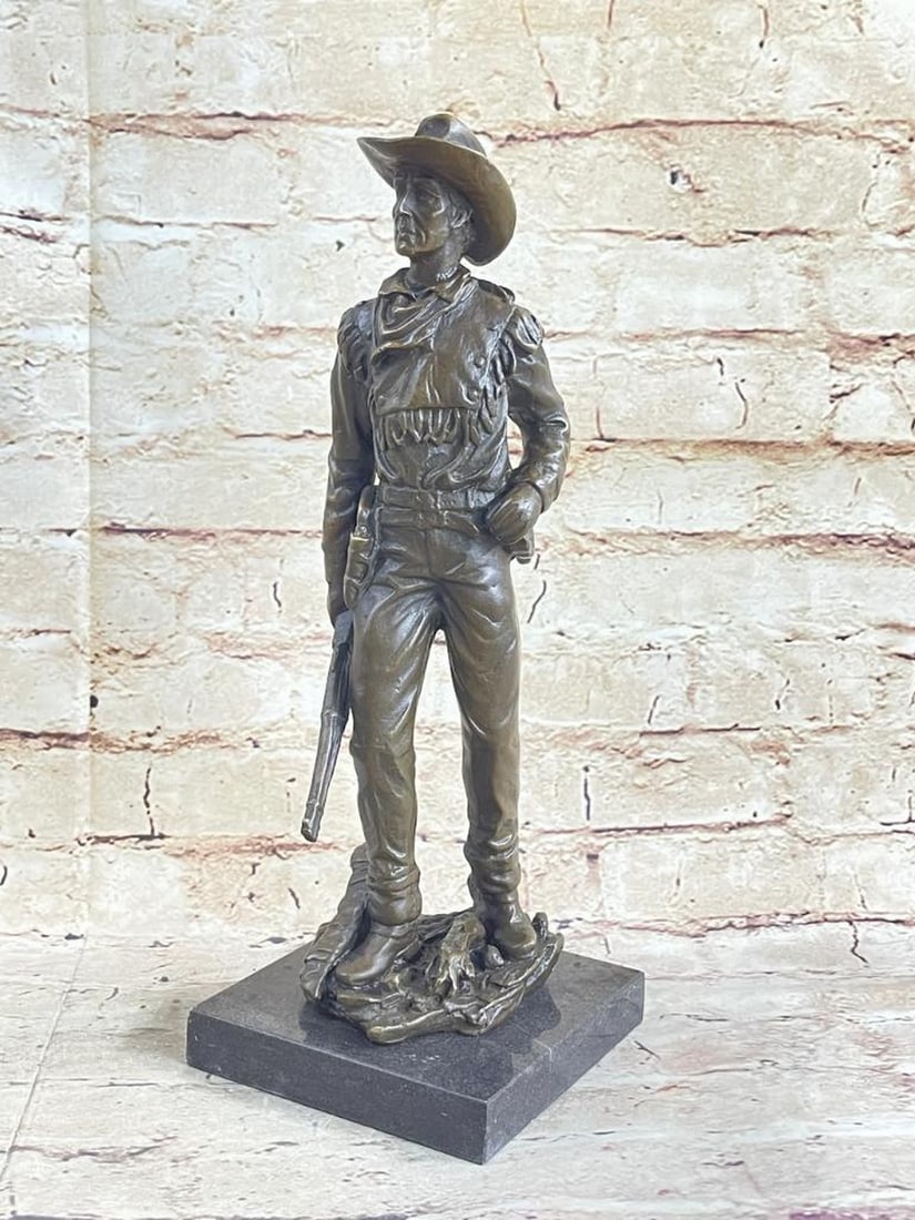 Cowboy Standing with Holstered Rifle Original Bronze Statue - 12.5" x 4.5": Cowboy Standing with Holstered Rifle Original Bronze Statue - 12.5" x 4.5" This bronze sculpture captures the rugged essence of a classic cowboy in stunning detail. Dressed in a cowboy hat, ha