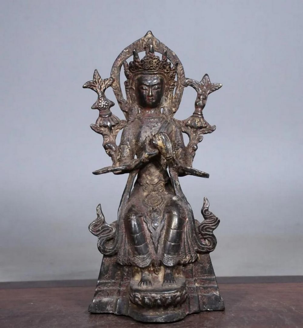 Gilded Copper Qiangba Buddha Statue: Gilded Copper Qiangba Buddha Statue This antique Qiangba Buddha statue is a rare and exquisite piece of traditional Chinese craftsmanship, meticulously handcrafted from pure copper and adorned with a 