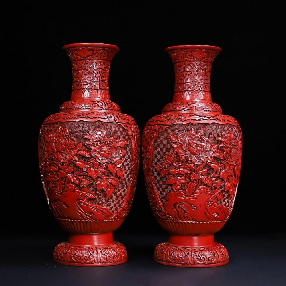 Chinese Style Pair of Red Lacquerware Vases with Floral Carving: Chinese Style Pair of Red Lacquerware Vases with Floral Carving This pair of vases features hand-carved floral patterns on red lacquerware in a Chinese-inspired design. Each vase displays detailed cra