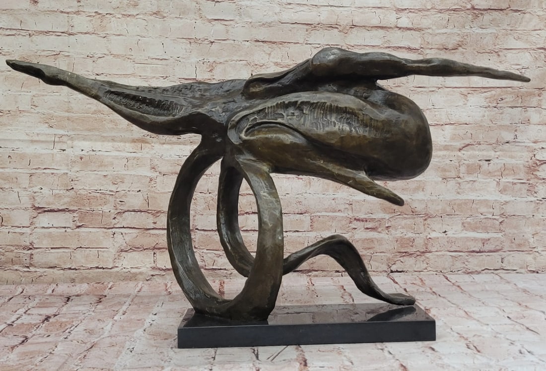 Surrealist Inspired Bronze Sculpture on Marble Base, Dali Signature – 17.5" x 32": Surrealist Inspired Bronze Sculpture on Marble Base, Dali Signature – 17.5" x 32" This bronze sculpture reflects a surrealist-inspired abstract form, mounted on a marble base. The piece feat