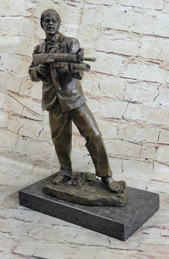 Tony “Scarface?? Montana Bronze Sculpture with Marble Base - 14" x 8": Tony “Scarface” Montana Bronze Sculpture with Marble Base - 14" x 8" This bronze sculpture depicts Tony “Scarface” Montana during his final stand, inspired by the memorable sce