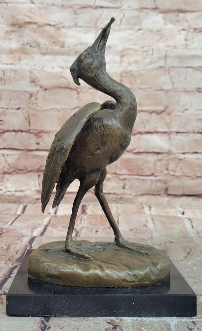 Agathon Léonard Reproduction Bronze Sculpture of Stork with Fish – 10.5" x 6": Agathon Léonard Reproduction Bronze Sculpture of Stork with Fish – 10.5" x 6" This bronze sculpture depicts a stork holding a fish, rendered with attention to proportion, posture, and surfa