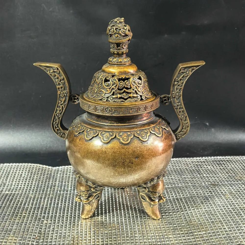 Exquisite Chinese Antique Handmade Rare Pure Copper Double-Ear Dragon Head Incense Burner: Exquisite Chinese Antique Handmade Rare Pure Copper Double-Ear Dragon Head Incense Burner Add a touch of imperial elegance to your space with this rare Chinese antique-style incense burner. Handcrafte