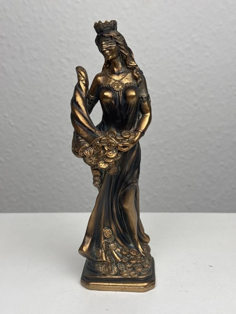 Fortuna – Goddess of Luck and Wealth Blackened Brass Statue: Fortuna – Goddess of Luck and Wealth Blackened Brass Statue A Greek-inspired Fortuna sculpture symbolizing destiny, fortune, and guidance. This elegant statue features a blackened brass finish with 