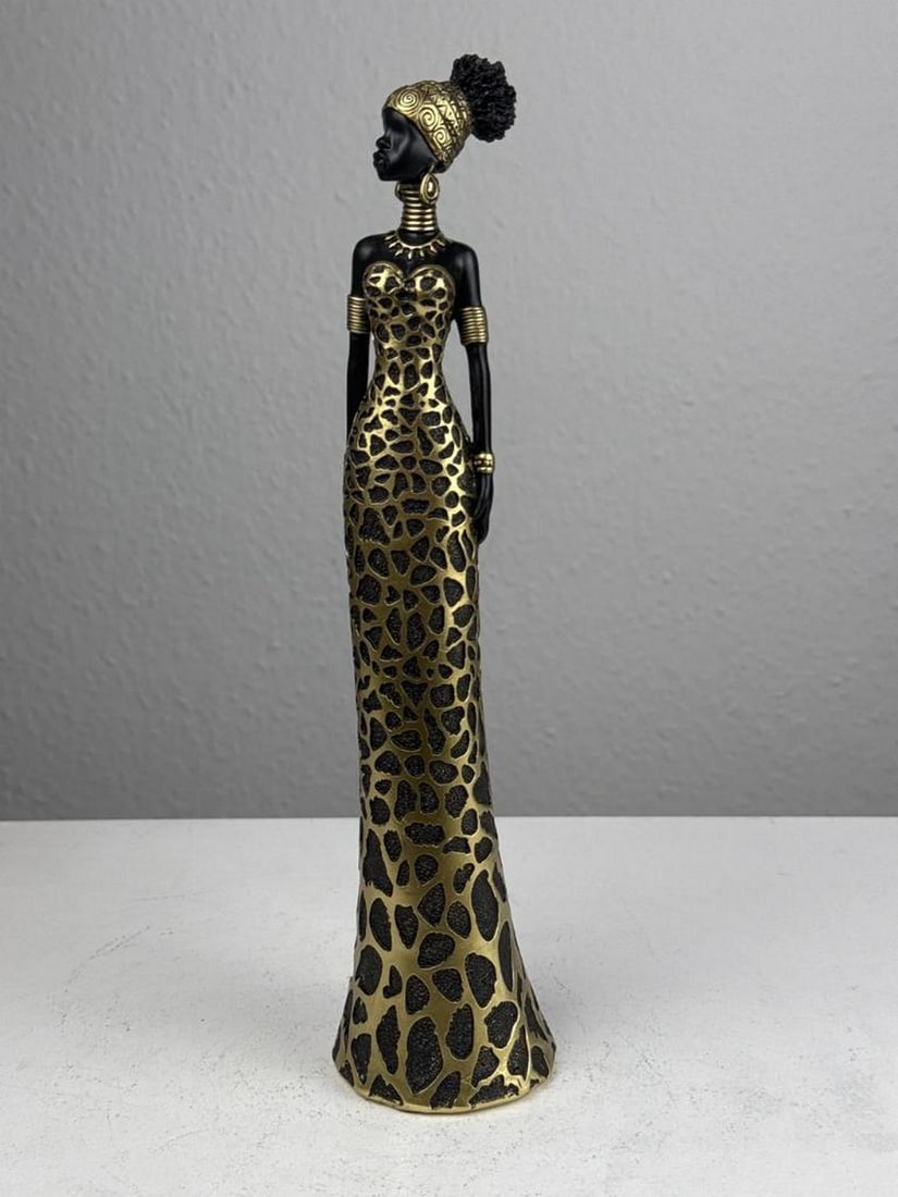 Leopard Elegance – African Lady Statue: Leopard Elegance – African Lady Statue Blending cultural elegance with contemporary style, this resin sculpture of an African woman draped in a flowing leopard dress creates a striking decorative fo