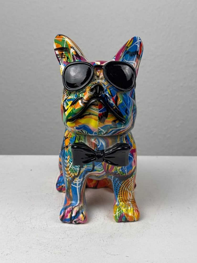 Bowtie Bulldog – Pop Art Graffiti Sculpture: Bowtie Bulldog – Pop Art Graffiti Sculpture This graffiti-inspired bulldog statue features a vibrant finish and a whimsical bowtie, radiating personality and flair. It’s a lively conversation star