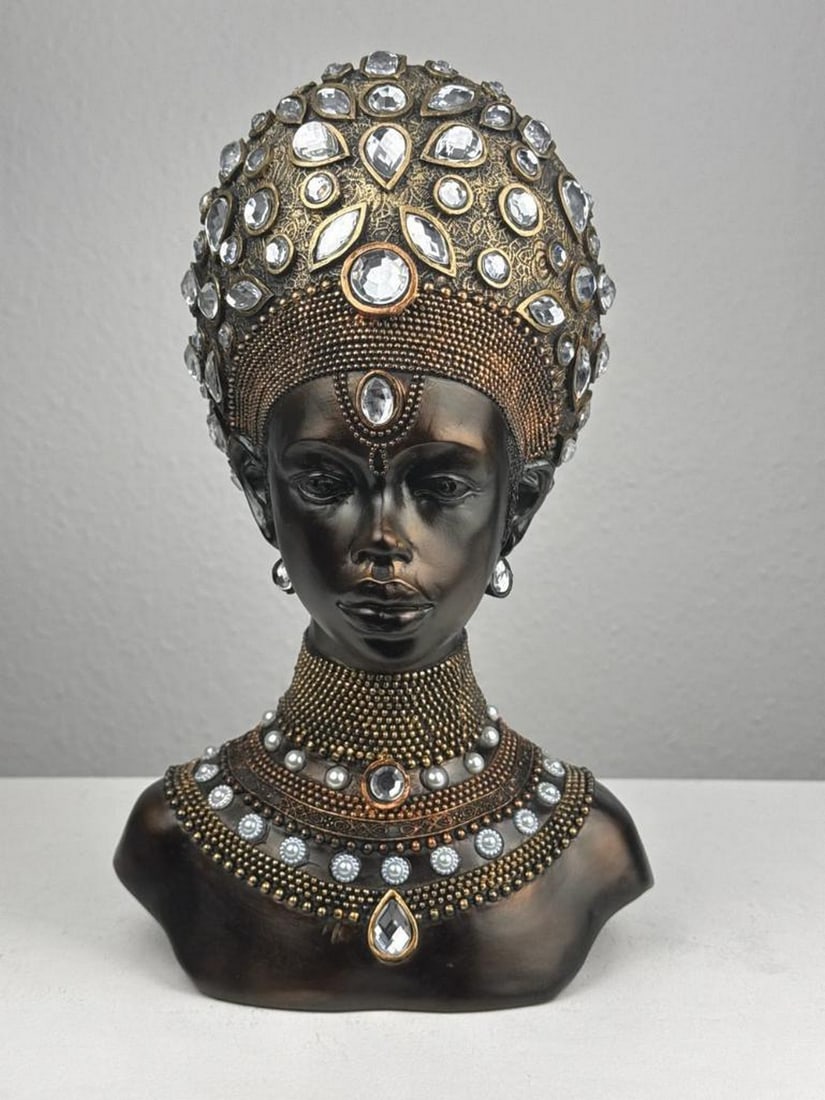 Regal African Queen Bust – Bronze Sculpture: Regal African Queen Bust – Bronze Sculpture This striking African queen bust is a powerful symbol of regal beauty, featuring intricate details and a stunning bronze finish. Ideal for collectors and 