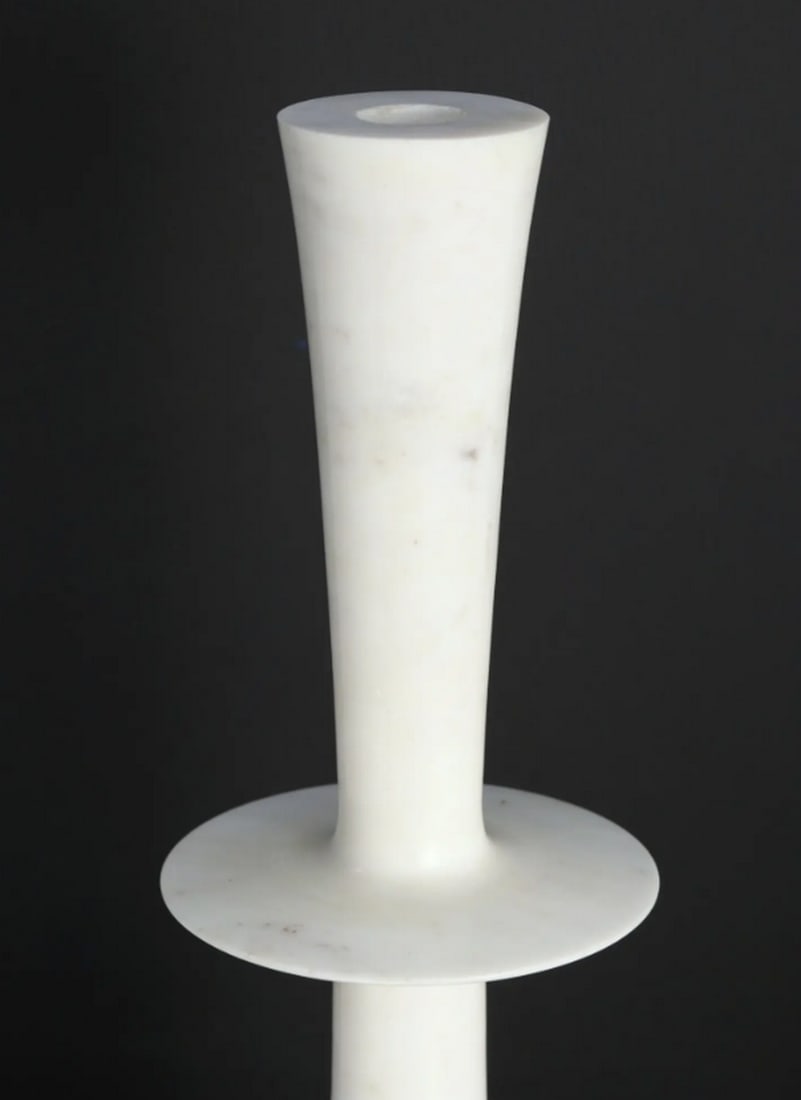 24" Designer White Marble Candle Holder: 24" Designer White Marble Candle Holder This 24" white marble candle holder features a slender hourglass shape with a polished surface that highlights the stone’s natural veining. Its sturdy