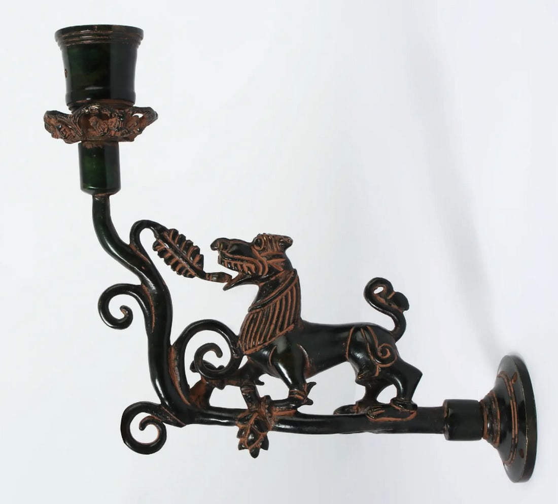 9" Brass Yali Design Candle Holder – Mythical Elegance & Traditional Craftsmanship: 9" Brass Yali Design Candle Holder – Mythical Elegance & Traditional Craftsmanship This Brass Yali Design Candle Holder Wall Decor is a striking fusion of artistry and utility. Featuring a v