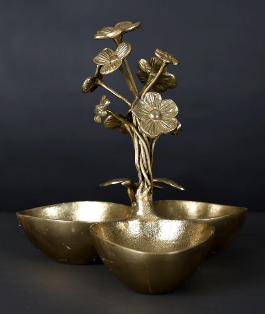 10" Triple Bowl Urli with Floral Design – Elegant Brass Home Décor Accent: 10" Triple Bowl Urli with Floral Design – Elegant Brass Home Décor Accent At the heart of this brass urli, a beautifully detailed central flower blossoms—an ode to traditional craftsmanship. 