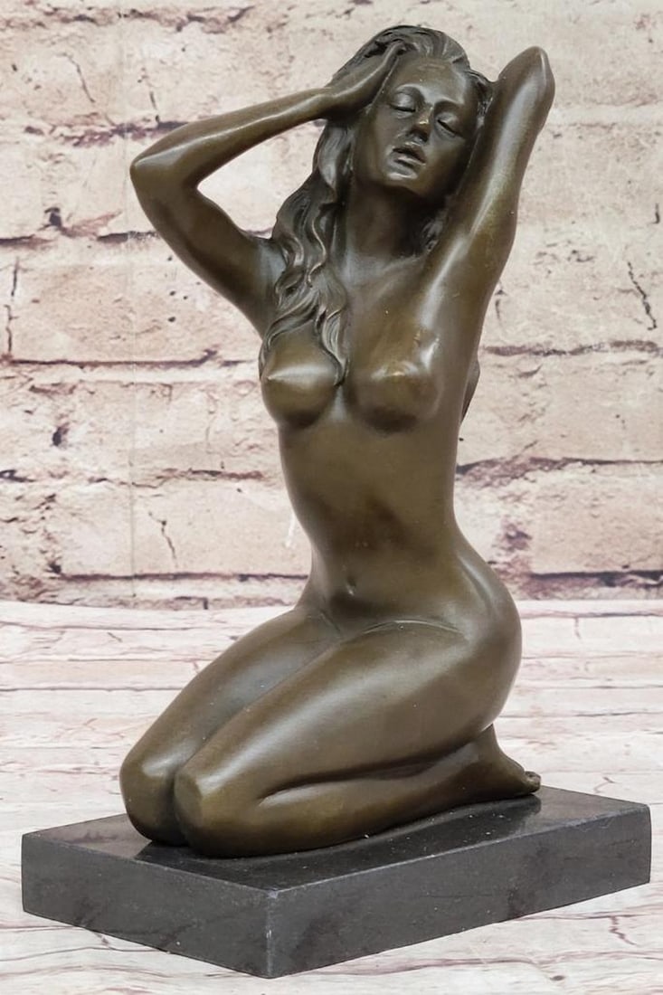 Female in Seductive Pose Original Bronze Statue - 9" x 5": Female in Seductive Pose Original Bronze Statue - 9" x 5" She embodies the artist's muse, seated gracefully before the easel. With poise, she arches her back, fingers combing through her w