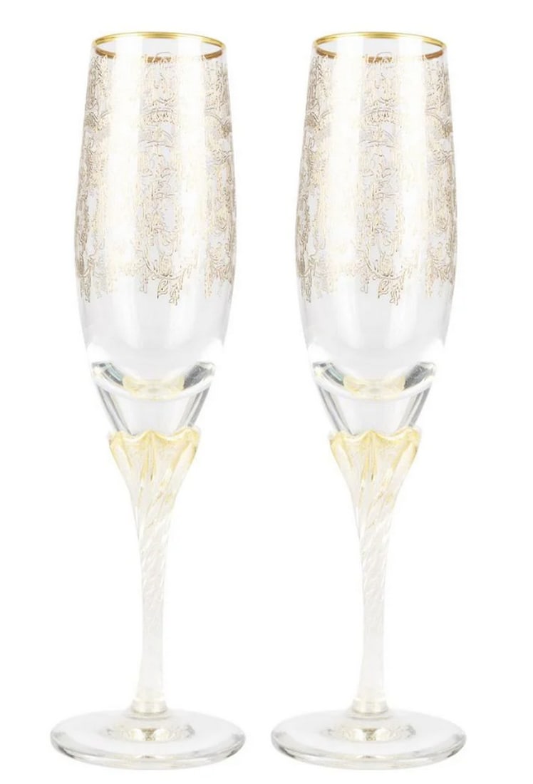 Barocco Crystal Champagne Flutes Set of Two - Gold Accents: Barocco Crystal Champagne Flutes Set of Two - Gold Accents These flutes feature intricate engravings created with a cold glass cut technique and are adorned with gold accents. Elevate your dining expe