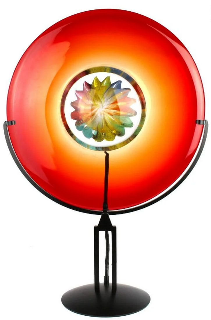Murano Glass Sunset Disc Table Lamp: Murano Glass Sunset Disc Table Lamp This exquisite disc table lamp is handcrafted using the submerged glass technique, showcasing the finest craftsmanship in its complex production process. The adjust