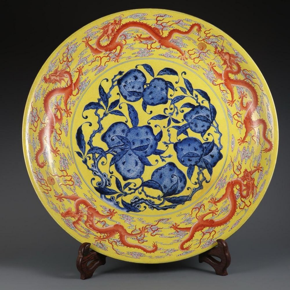 Large Yellow-Glazed Blue & White Plate with Dragons and Peaches: Large Yellow-Glazed Blue & White Plate with Dragons and Peaches This impressive large plate is inspired by the time period when Guangxu reigned during the Qing Dynasty and bears the esteemed Chuxi
