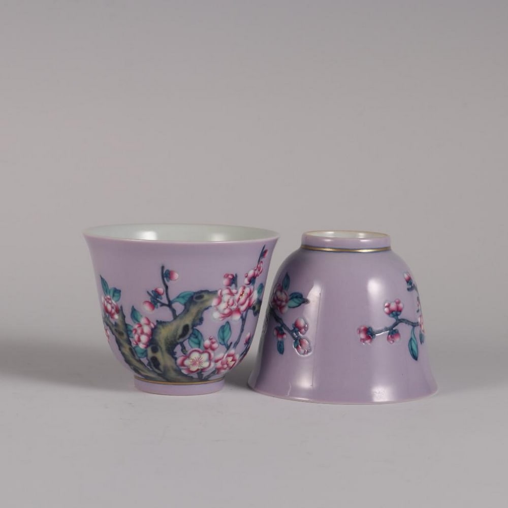 Qing Yongzheng Inspired Pink Glaze Bell Cup Pair: Qing Yongzheng Inspired Pink Glaze Bell Cup Pair Inspired by the delicate refinement of the Qing Dynasty Yongzheng period, this elegant pair of bell-shaped cups radiates serene beauty and balance. Eac