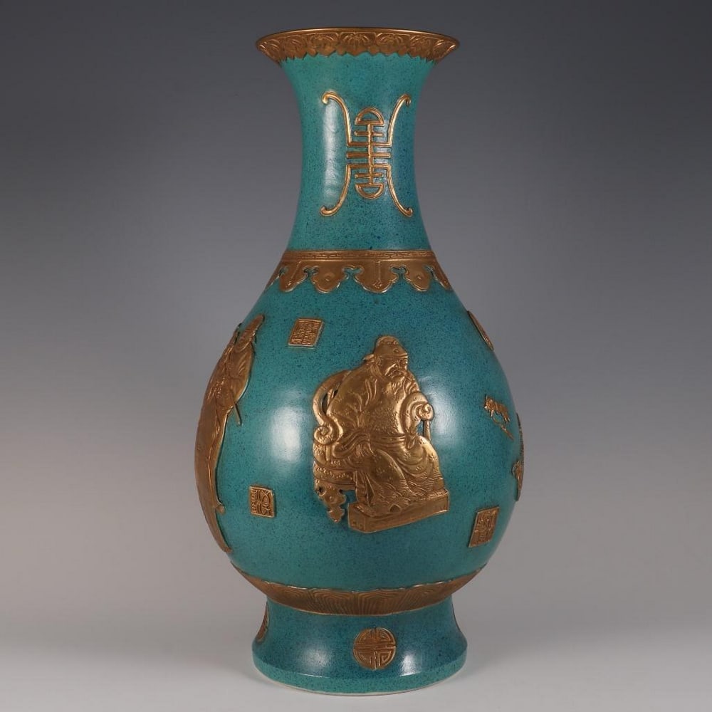 Qianlong Period Qing Dynasty Lu Jun Glaze Gilt Bottle: Qianlong Period Qing Dynasty Lu Jun Glaze Gilt Bottle This exquisite blue-glazed bottle, inspired by the Qianlong reign of the Qing Dynasty, features the distinctive Lu Jun glaze known for its rich, l