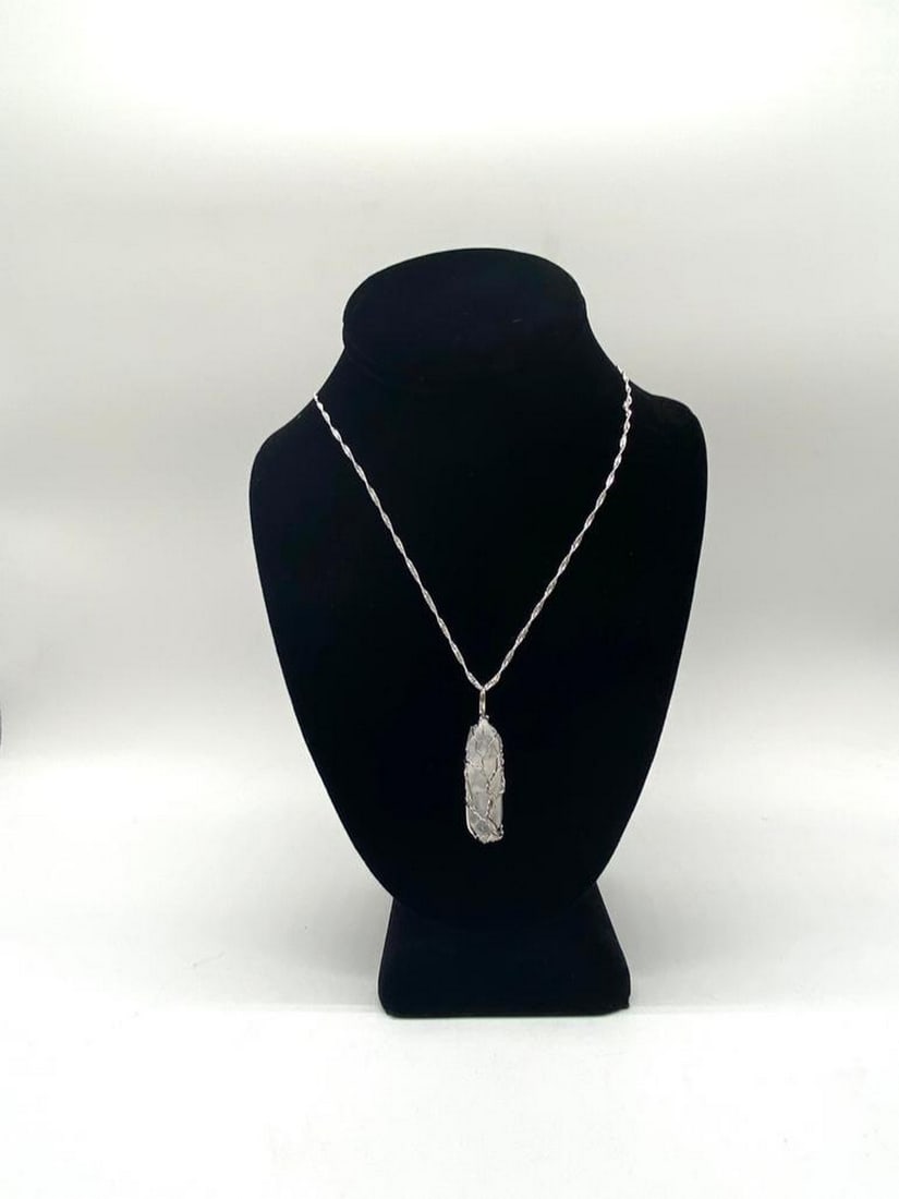 Clear Quartz Gem Stone Chakra Reiki Healing Amulet With Silver Tree Of Life Details: Clear Quartz Gem Stone Chakra Reiki Healing Amulet With Silver Tree Of Life Details This white crystal is considered a “master healer.” It's said to amplify energy by absorbing, storing, r