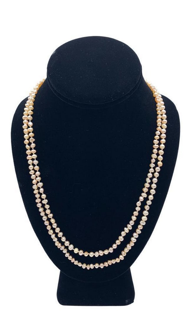 Radiant Petite Pink Pearl Necklace: Radiant Petite Pink Pearl Necklace Pink pearls represent good health, generosity, love, kindness, compassion, loyalty and happiness. This beautiful, classy necklace will add just the touch you need