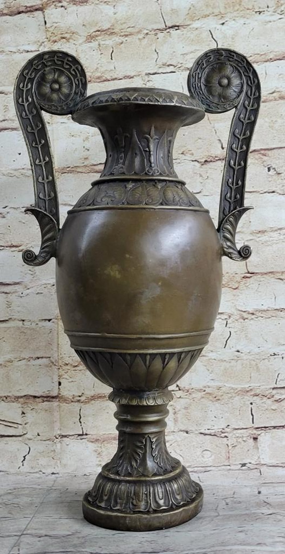 Regal Elegance Original Bronze Vase by Fisher - 16" x 9": Regal Elegance Original Bronze Vase by Fisher - 16" x 9" This regal and elegant vase exudes timeless sophistication, making it a standout decorative piece for any room. With elaborate handles 