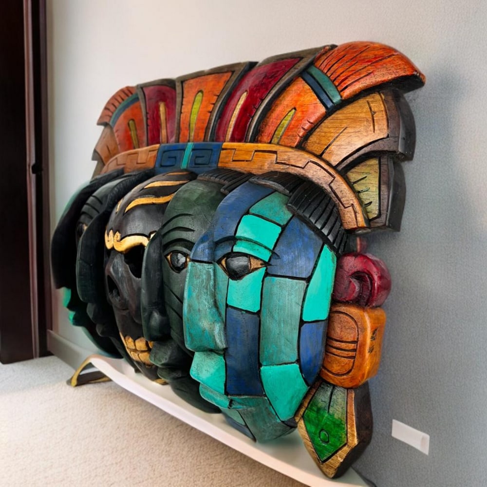 Mask of Death & Rebirth - Mayan Handcrafted Wall Art: Mask of Death & Rebirth - Mayan Handcrafted Wall Art This stunning Mayan mask, handcrafted by skilled artisans, symbolizes the continuous cycle of life, death, and rebirth. With three layered face