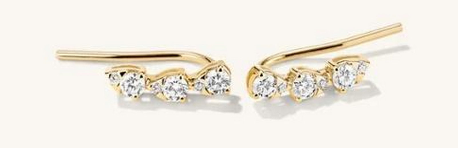 Radiant Lab-Grown Diamond Climber Studs: Radiant Lab-Grown Diamond Climber Studs. These studs offer a perfect blend of elegance and modern sophistication. The pear-shaped lab-grown diamonds, ethically crafted, sparkle brilliantly in a sleek