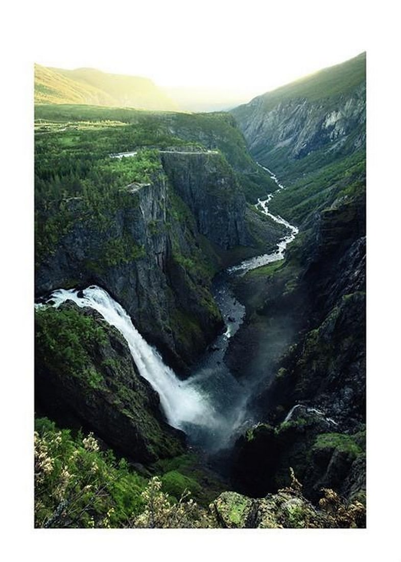 Vøringsfossen Waterfall Poster Print: Vøringsfossen Waterfall Poster Print Voringsfossen Waterfall captures the breathtaking power and beauty of one of Norway's most iconic natural wonders. Cascading dramatically down a rugged cliff,