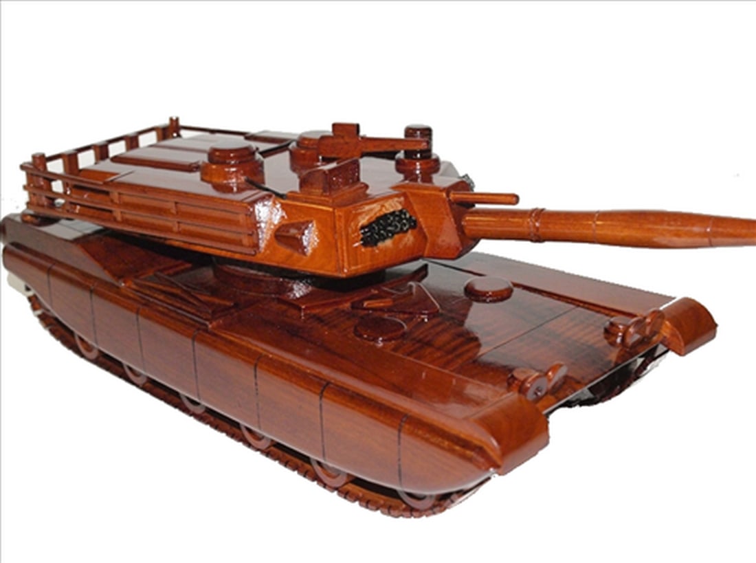 M1A/M1A2 Abrams Tank: M1A/M1A2 Abrams Tank Handcrafted from solid mahogany, this Abrams tank is finely detailed with movable gun turret and track. Three coats of polyurethane finish adds high gloss and rich wood grain