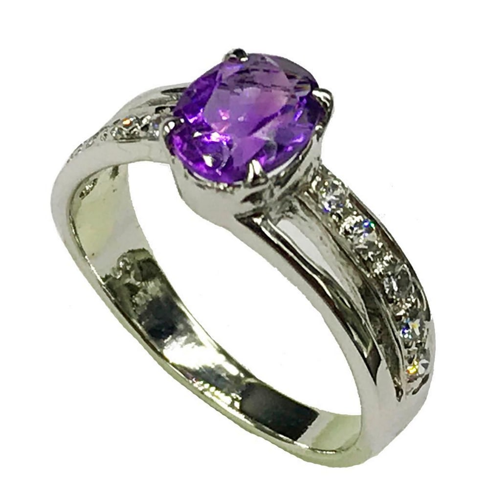 925 Sterling Silver Ring with Austrian Crystal Double Band with Amethyst Gemstone in a Halo Setting: 925 Sterling Silver Ring with Austrian Crystal Double Band with Amethyst Gemstone in a Halo Setting. Amethyst crystals represent purification and connection to spiritual and divine beings. The meaning