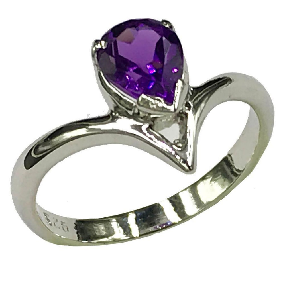 925 Sterling Silver Ring with an Teardrop Amethyst Gemstone in a Teardrop Setting: 925 Sterling Silver Ring with an Teardrop Amethyst Gemstone in a Teardrop Setting. The crystals represent purification and connection to spiritual and divine beings. The meaning of amethyst is attache