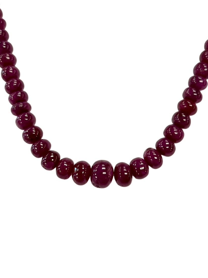 Ruby Beads Necklace: Ruby Beads Necklace Ruby plain beads string necklace, Beads diameter- 4.9 to 7.8 mm, Length of necklace- 45 cms View photos for further details.