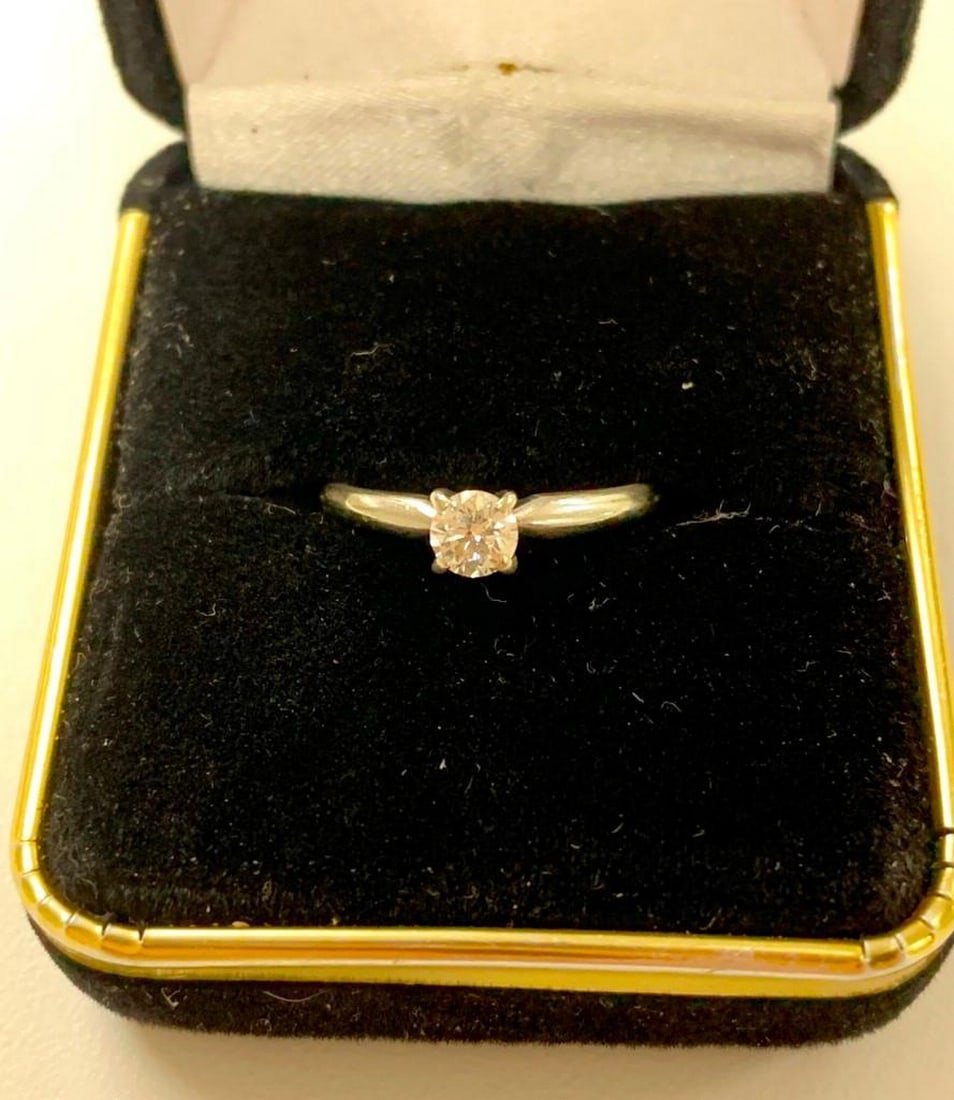 14KT White Gold Ladies Hand Assembled Custom Made Diamond Solitaire Engagement Ring: This fabulous ring contains, one claw set round brilliant cut diamond, measuring 4.45 - 4.40 - x 2.75mm(depth est.) approximate weight of 0.33ct. Comes with Gem Lab appraisal report. Colour - H - I
