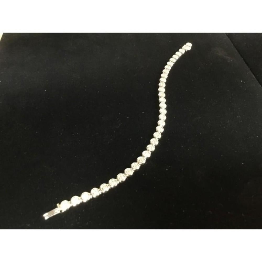 Exquisite 18K White Gold Woman's Bracelet With 3.4ct Inset Diamonds: An Exquisite 18K Solid White Gold Woman's Bracelet With 3.4ct of Inset Diamonds (VS,F2G,Good). A flag ship of Italian Craftsmanship for ladies fashion and apparel. This Bracelet is favorite in custom