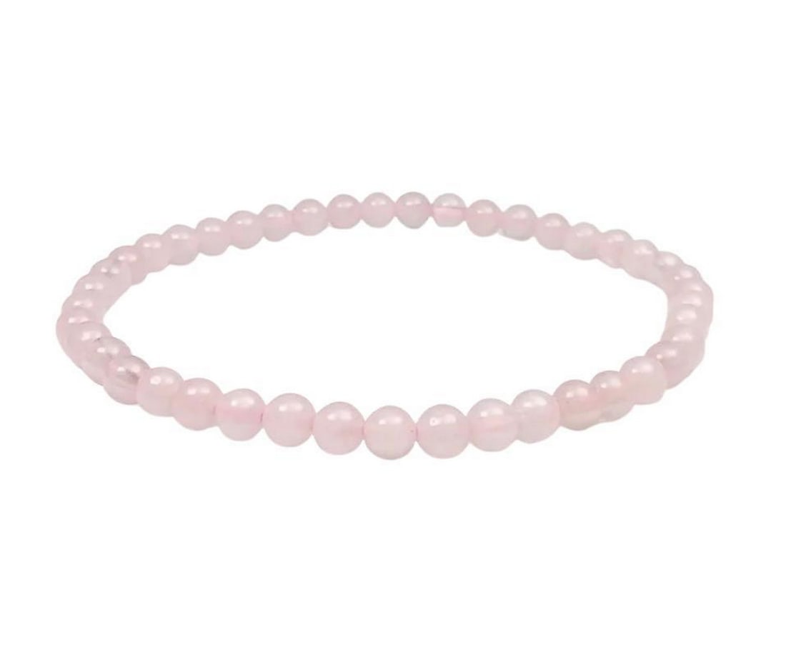 4mm Bead Rose Quartz Bracelet: 4mm Bead Rose Quartz Bracelet Rose quartz is a pink colored semi-precious gemstone. The pink color is caused by traces of manganese or titanium and will range from a light to dark pink color. Its