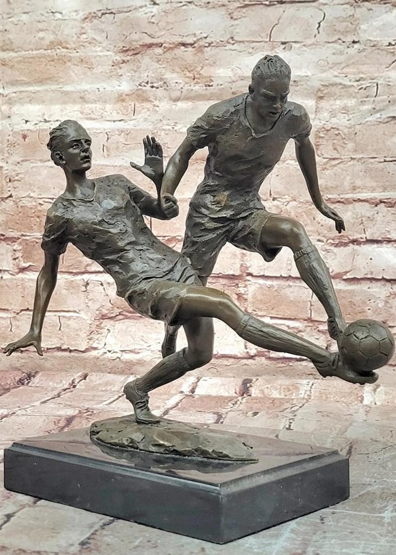 Miguel Lopez (Milo) Original Bronze Soccer Players Sculpture on Marble Base – 10.5" x 9.5": Miguel Lopez (Milo) Original Bronze Soccer Players Sculpture on Marble Base – 10.5" x 9.5" This bronze sculpture depicts two soccer players in action, rendered with attention to athletic for