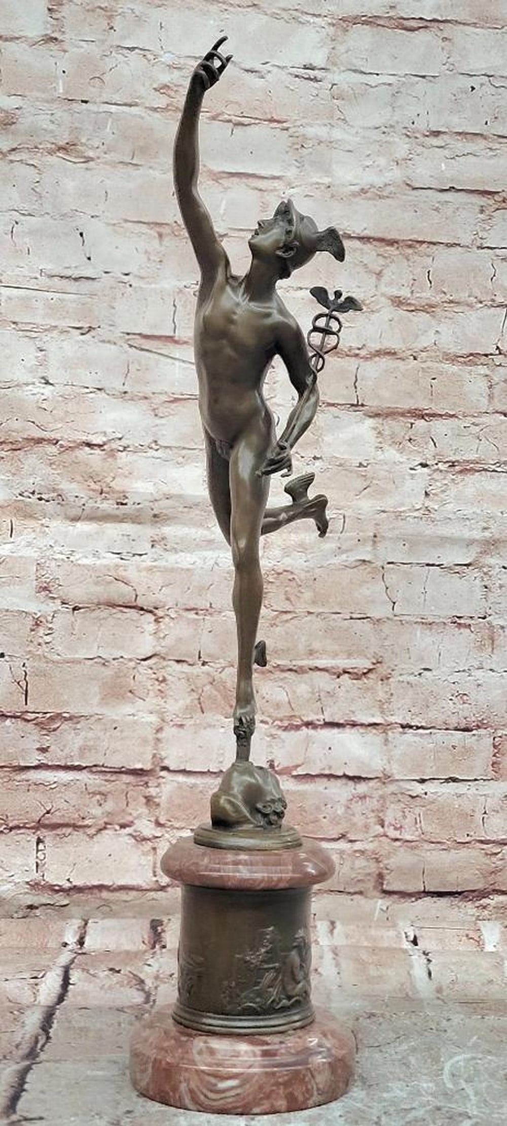 Giambologna Flying Mercury Bronze Sculpture on Marble Base – 20" x 8": Giambologna Flying Mercury Bronze Sculpture on Marble Base – 20" x 8" This bronze sculpture depicts Mercury in mid-flight, rendered with attention to proportion, dynamic movement, and anatom