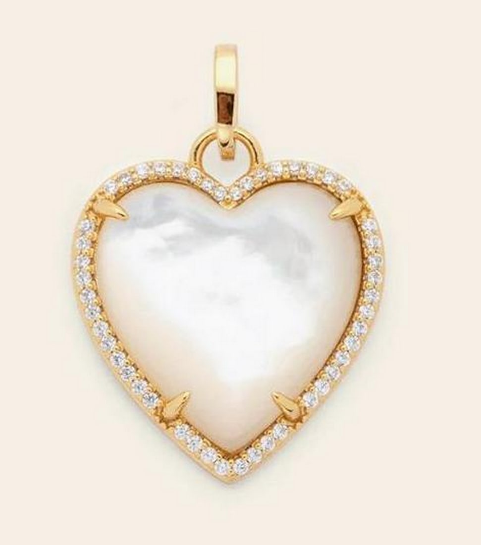 Luminous Heart Charm – Gold Vermeil/Mother of Pearl: Luminous Heart Charm – Gold Vermeil/Mother of Pearl Soft sheen with a timeless glow, the Luminous Heart Charm features mother of pearl for a naturally iridescent finish. Crafted in 14k gold vermeil 