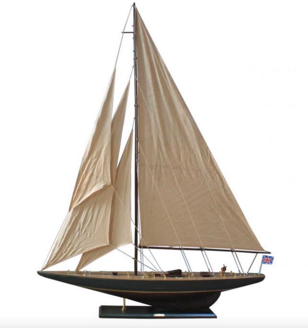 Rustic Wooden Endeavor Model 60" Sailboat Decoration: Rustic Wooden Endeavor Model 60" Sailboat Decoration With the wind’s unbound freedom and the graceful speed of the waves, this rustic model sailing ships of America’s Cup winner, racing yacht