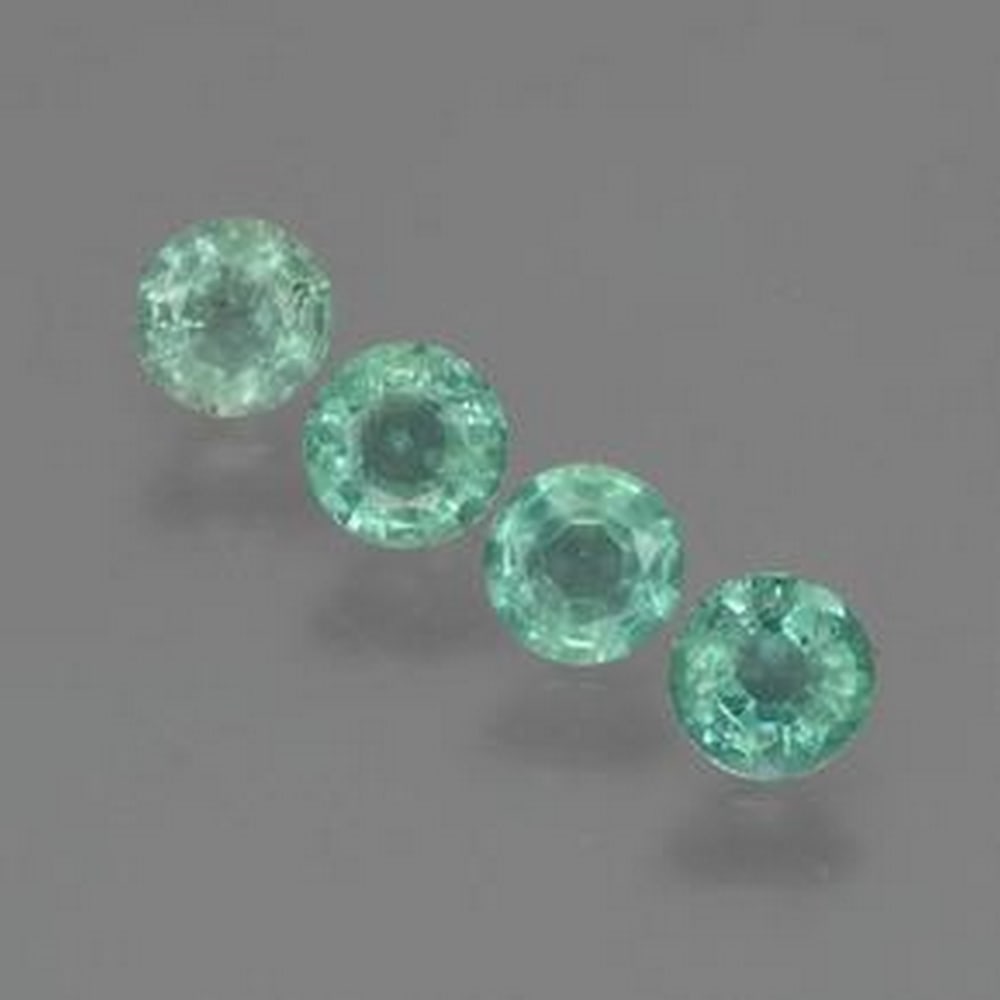 0.75ct Round Cut Light Green Emeralds: 0.75ct Round Cut Light Green Emeralds This lot contains 4 round cut emeralds all at 0.19ct each. Raw Dimension: 3.7 x 3.7mm Treated Yes. An oil has been used to fill in fractures in the stone for