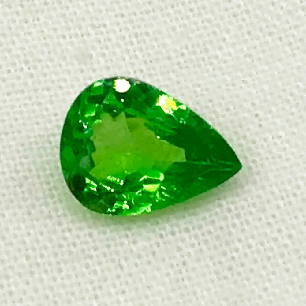 1.22ct Tsavorite Pear Faceted Gemstone: Tsavorite Pear Faceted Tsavorite pear flawless gemstone, Size- 8.2x6.2 mm, Weight- 1.22 ct View photos for further details.