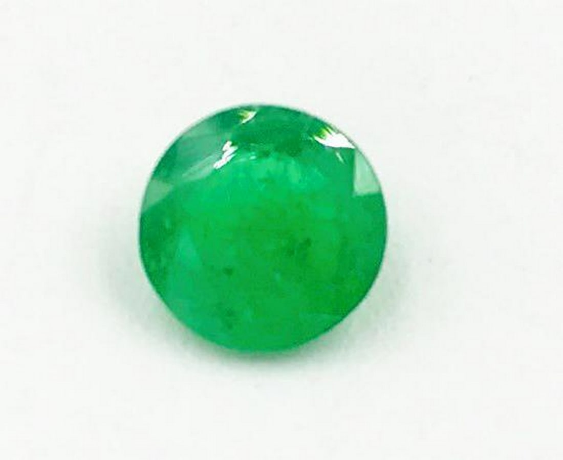 0.7ct Faceted Emerald Round Gemstone: Faceted Emerald Round For many, emerald is considered to be the symbol of rebirth. It is also believed to represent good fortune, youth, balance, growth, peace, and foresight Size- 6.0 mm, Weight-